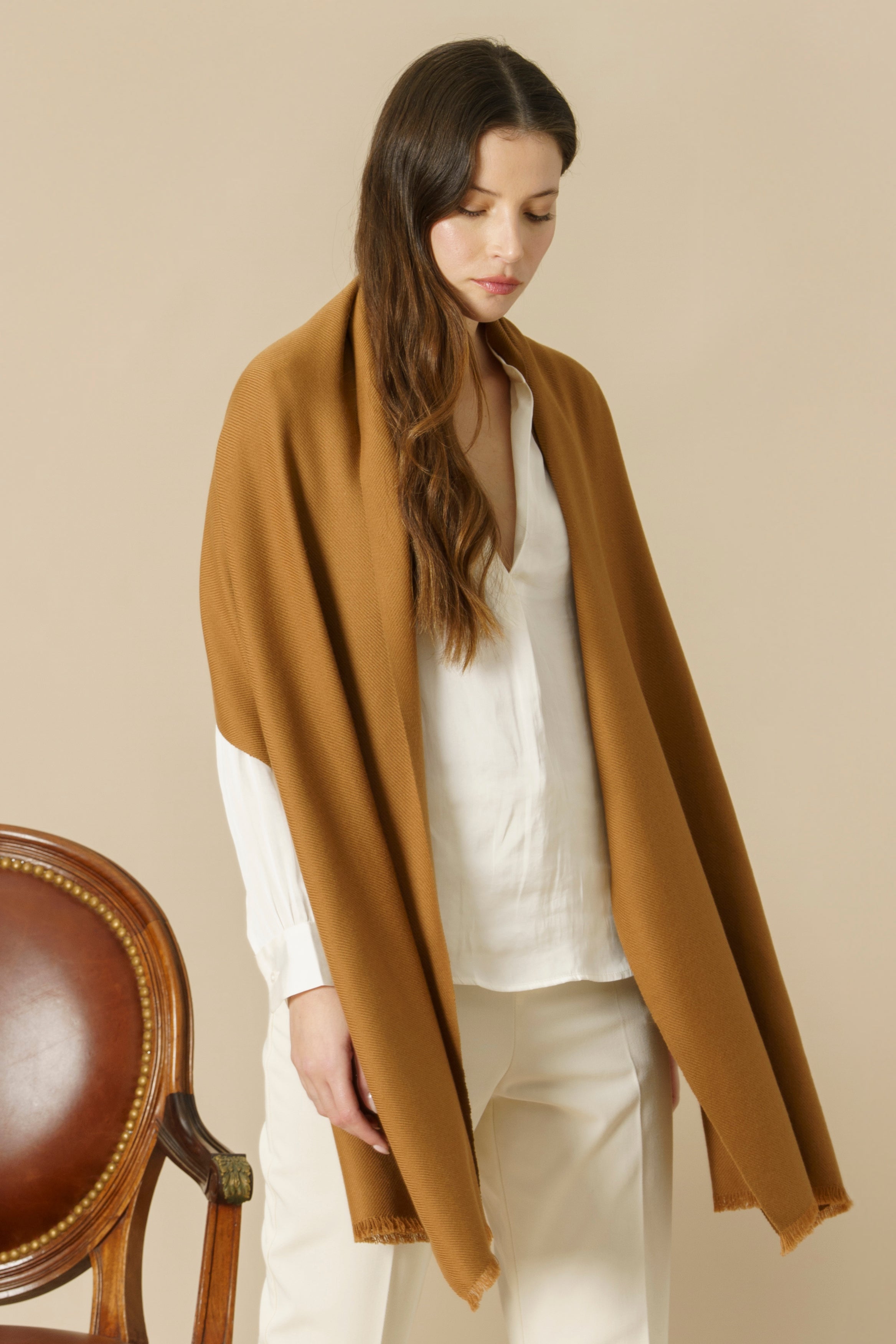 Ultra-fine 10-micron vicuña wool scarf woven on historic 19th-century hand-looms.