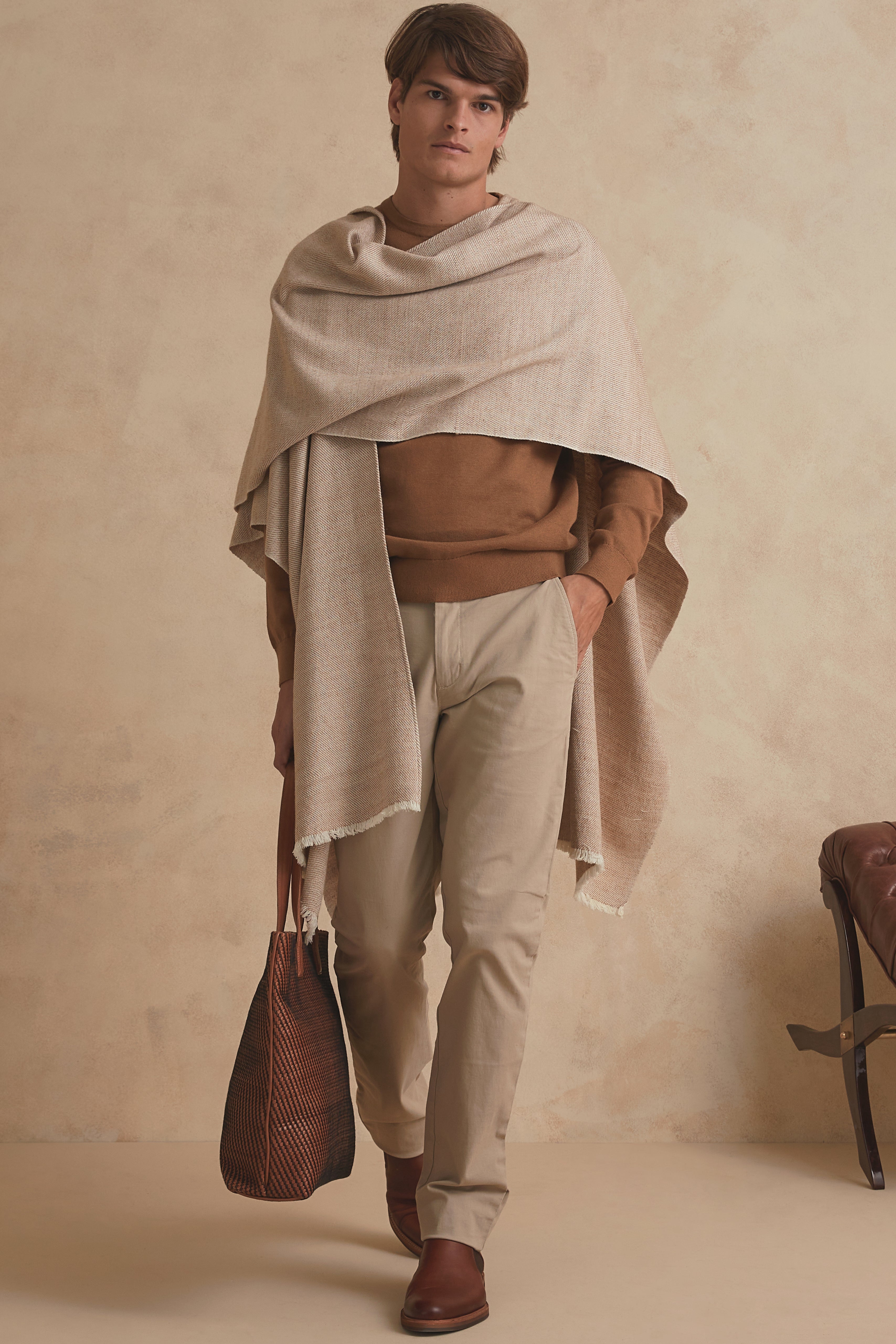 Handwoven wrap for men made of Guanaco fiber and Patagonia merino wool in natural color.